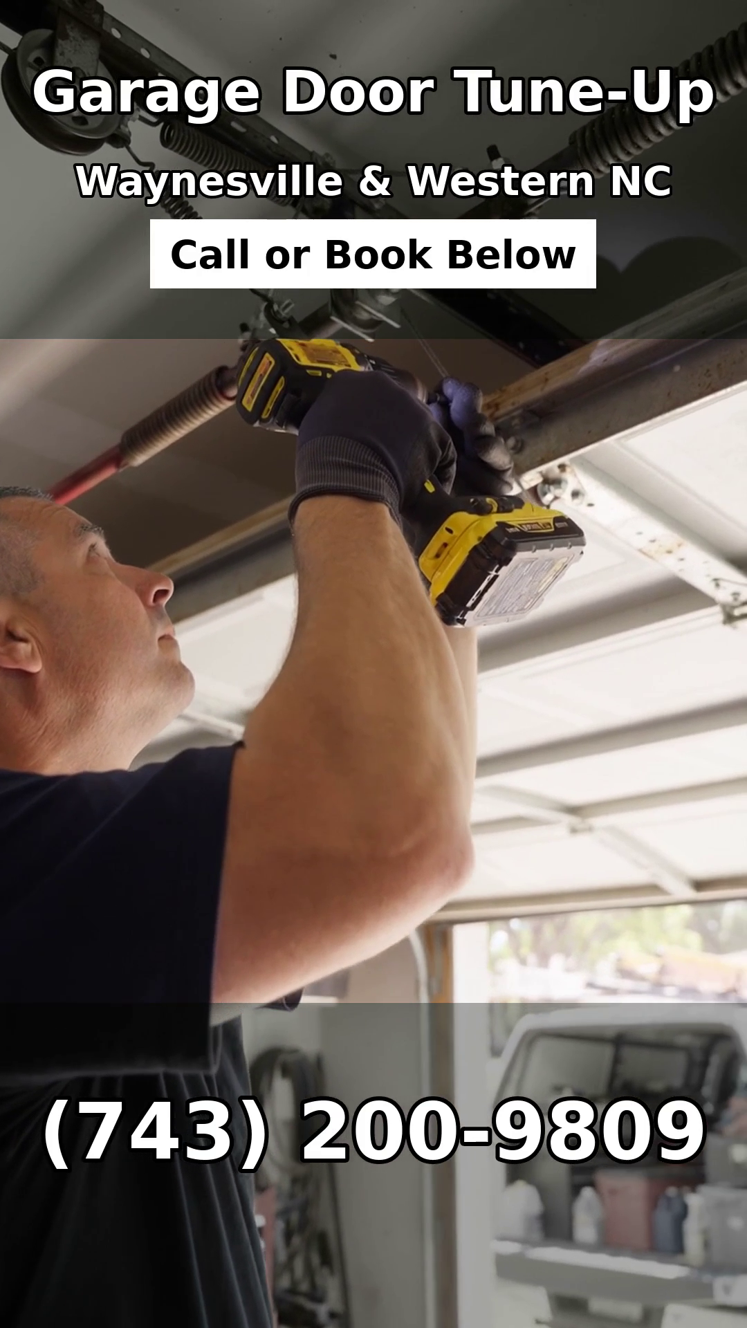 A technician doing a garage door tune-up